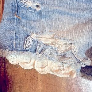 Women’s American Eagle Shortie Denim Shorts. Eyelet distressed. Size 0